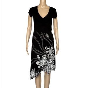 Danza black jersey dress with white floral appliqué